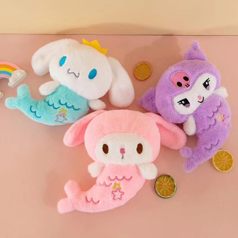 Marine, folklore and Sanrio fans alike will adore these Sanrio Mermaid Plushies. Soft colors, a few embroidered scales and stars, together with sweet, gentle smiles, make these dolls perfect for admiring and for snuggling.