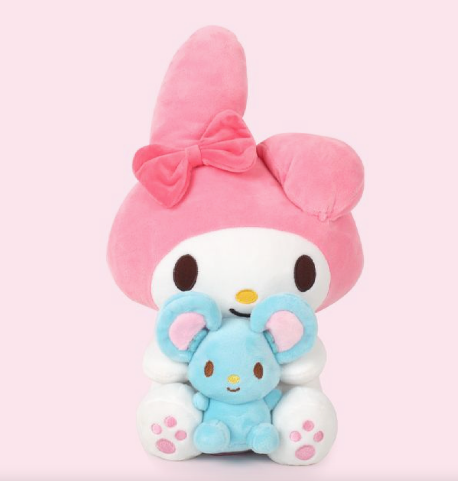 Calling all Sanrio fans! Add a dose of happiness to your life with the adorable My Melody and Mascot Plushie, featuring your favorite character holding their beloved mascot. This charming plushie is the perfect gift or decoration to make your space extra kawaii and bring a smile to your face every day!