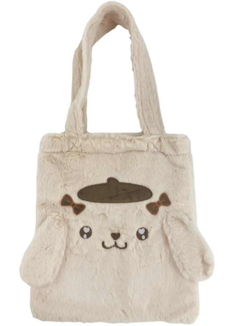 Sanrio’s soft Pompompurin Fuzzy Feelings Tote Bag is functional and stylish.  With a pair of brown bows, signature floppy ears and embroidered heart eyes. Show your plush love while on the move.