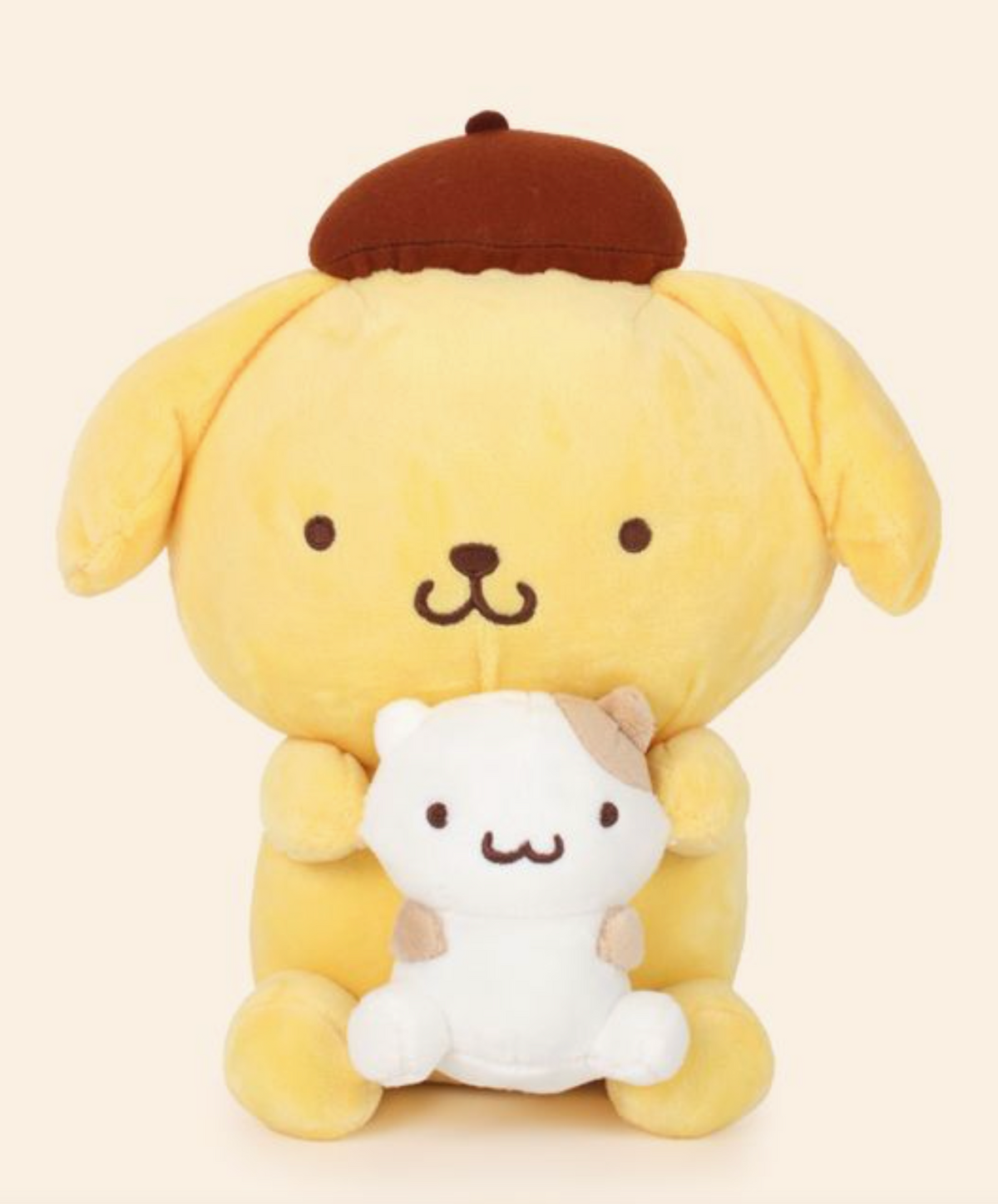 Calling all Sanrio fans! Add a dose of happiness to your life with the adorable Pompompurin and Mascot Plushie, featuring your favorite character holding their beloved mascot.  This charming plushie is the perfect gift or decoration to make your space extra kawaii and bring a smile to your face every day!