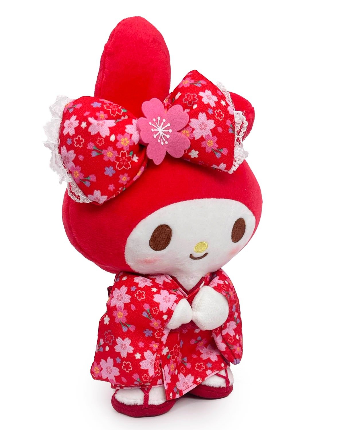 My Melody, charming generations of admirers for decades, appears as a high quality plush in cherry blossom kimono with matching sakura bow. Vibrant reds and flushing cheeks bring the fire.  Sanrio collectors, grab this special Red Cherry Blossom Kimono My Melody Plushie while supplies last!