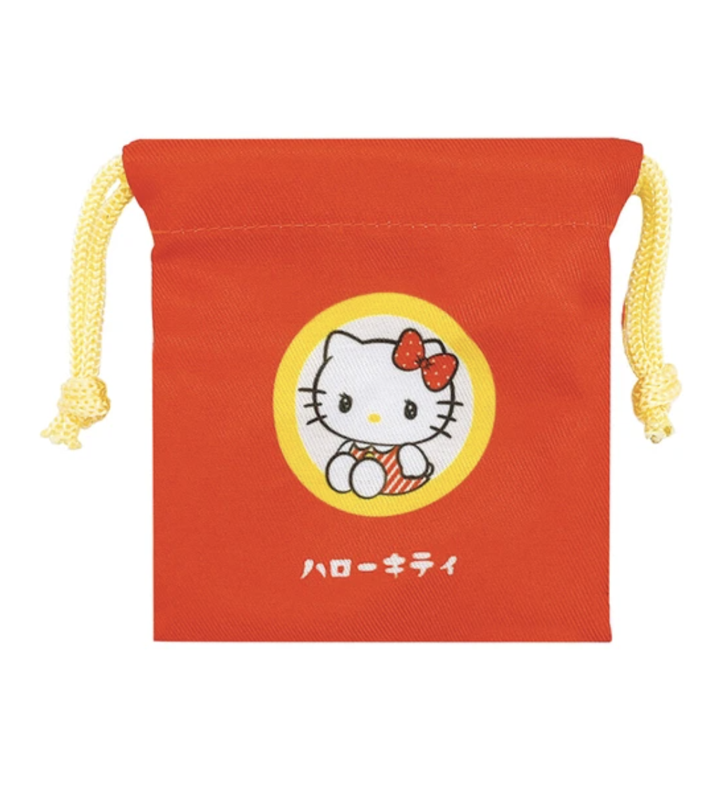 Keep your small treasured items safe in these adorable Sanrio Retro Pop Blindbox Pouches! These bags feature our beloved Sanrio friends in cute retro outfits. Designed with a drawstring closure, you can store makeup items, jewelry, or treats in these bags.