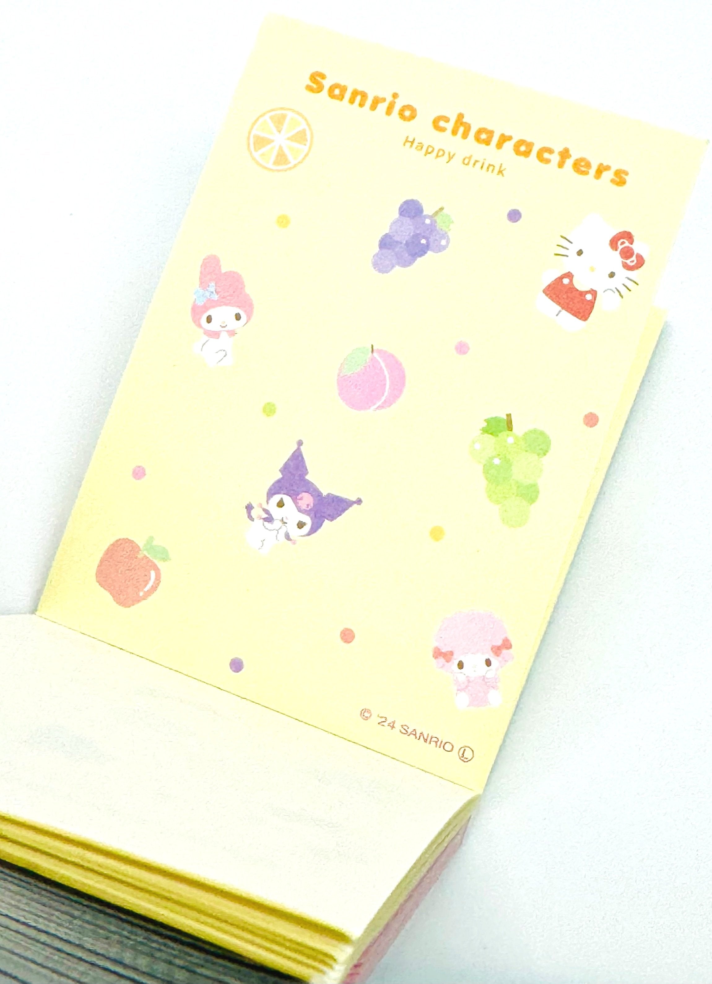 Sanrio’s new die-cut memo pads are bursting with fruity fun and soda-themed charm! These adorable notepads feature vibrant designs inspired by everyone's favorite Sanrio characters, adorned with tantalizing fruits and refreshing soda motifs.