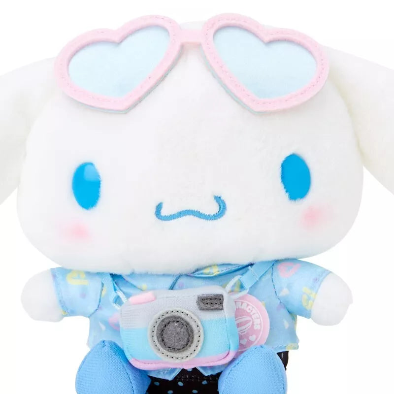 Feelin' like you need a vacation big time? Wherever that paradise may be, you can always dream big about it with the Sanrio in Vacation Mode Cinnamoroll Plushie - maybe some day you can take it with you! With passport in hand, and real-zip side bag, this adorable travel companion is ready for any adventure.

Fitted in lovely leisurely attire with a bag strapped around their waist, they are all set to go! Their cute outfits and cheerful expressions will bring a smile to your face as you explore new places to