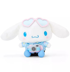 Feelin' like you need a vacation big time? Wherever that paradise may be, you can always dream big about it with the Sanrio in Vacation Mode Cinnamoroll Plushie - maybe some day you can take it with you! With passport in hand, and real-zip side bag, this adorable travel companion is ready for any adventure.

Fitted in lovely leisurely attire with a bag strapped around their waist, they are all set to go! Their cute outfits and cheerful expressions will bring a smile to your face as you explore new places to