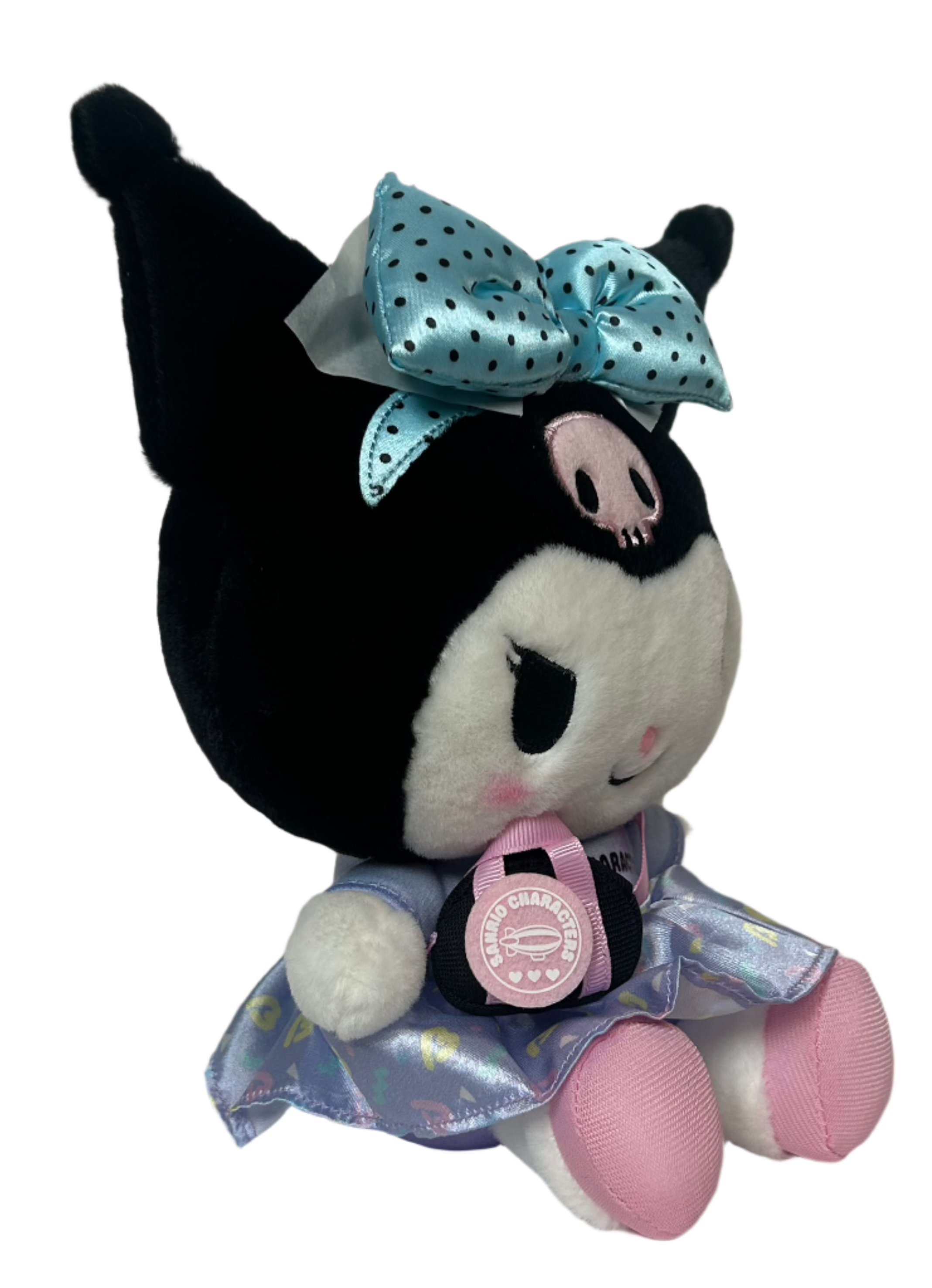 Feelin' like you need a vacation big time? Wherever that paradise may be, you can always dream big about it with the Sanrio in Vacation Mode Kuromi Plushie - maybe some day you can take it with you! This adorable travel companion is ready for any adventure.