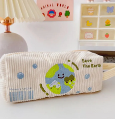 Organize your stationery in style while making an eco-friendly choice with our "Save the Earth" Corduroy Pencil Case. Crafted from high-quality, durable corduroy fabric and embroidered with a lovable planet earth design, this pencil case features a convenient handle and a soft cotton flannel to protect your items.