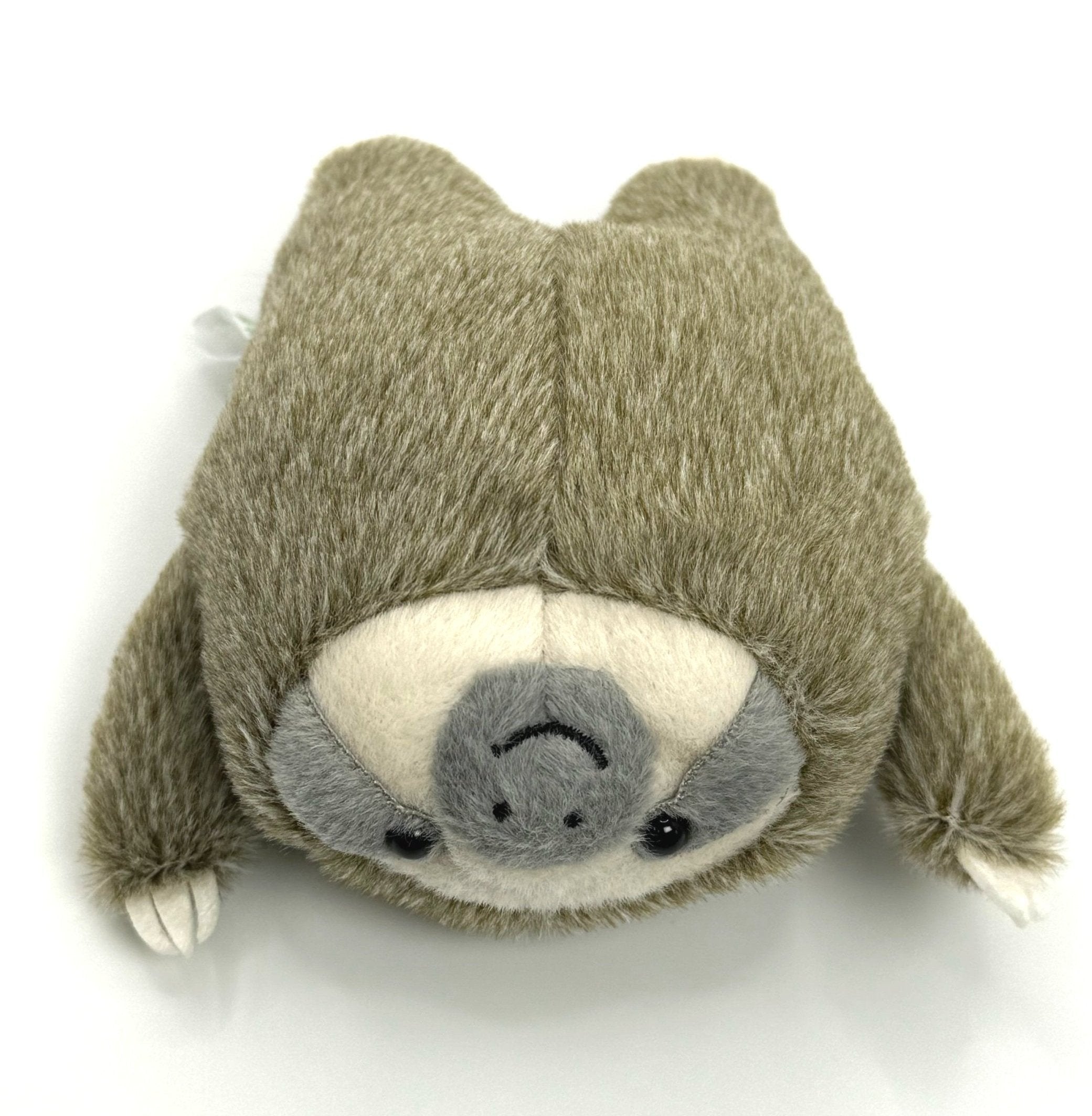 The Sloth Weighted Mini Plushie is a palm-sized plush toy with a chubby, round form, the ever-popular sloth appears in a unique position.   The soft and fluffy texture will make you want to pet it forever! Small beans in its back give it a perfect soothing weight.