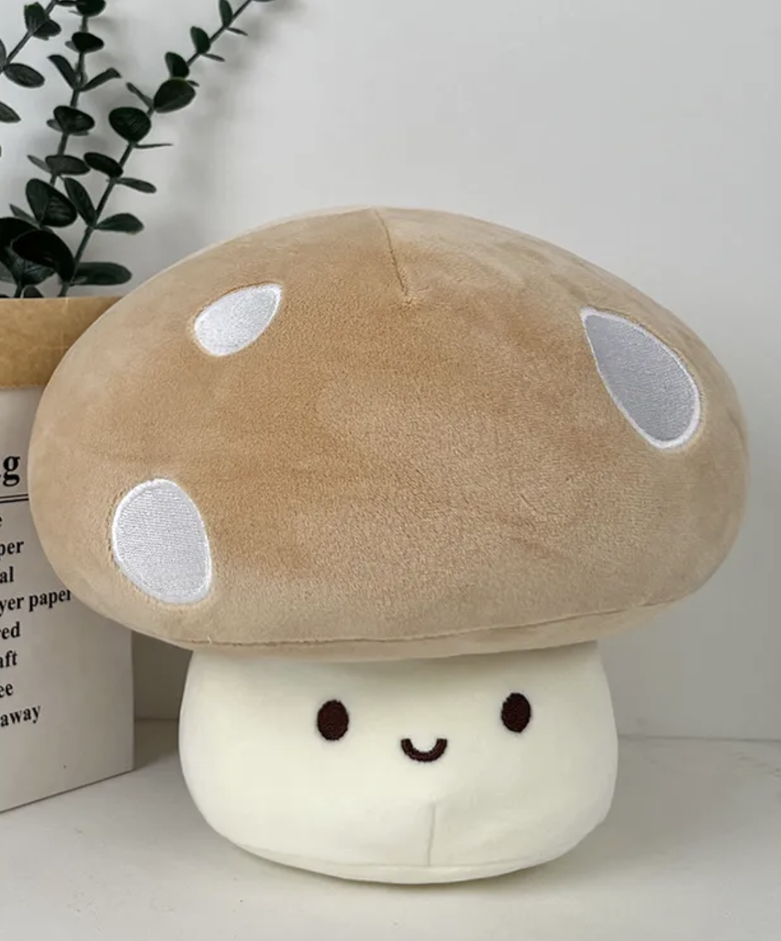 The whimsical Smiling Mushroom Plushie Gang! A vibrant array of adorable fungi companions that will add a pop of color and cheer to any space! Each plush in this collection is lovingly crafted with soft, huggable materials and comes in a variety of bright and playful colors.