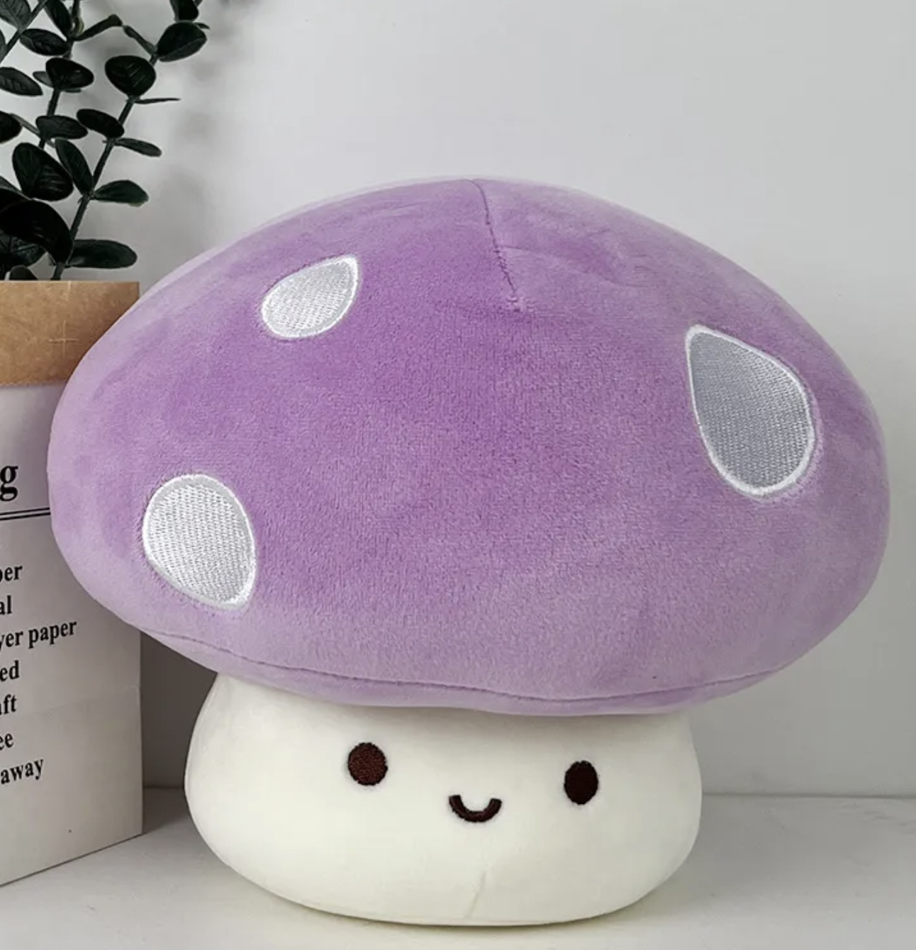 The whimsical Smiling Mushroom Plushie Gang! A vibrant array of adorable fungi companions that will add a pop of color and cheer to any space! Each plush in this collection is lovingly crafted with soft, huggable materials and comes in a variety of bright and playful colors.