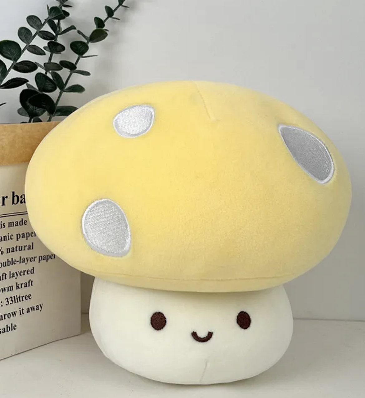 The whimsical Smiling Mushroom Plushie Gang! A vibrant array of adorable fungi companions that will add a pop of color and cheer to any space! Each plush in this collection is lovingly crafted with soft, huggable materials and comes in a variety of bright and playful colors.