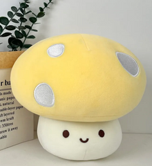 The whimsical Smiling Mushroom Plushie Gang! A vibrant array of adorable fungi companions that will add a pop of color and cheer to any space! Each plush in this collection is lovingly crafted with soft, huggable materials and comes in a variety of bright and playful colors.