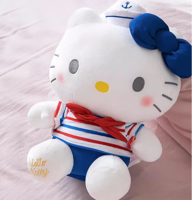Set sail on a sea of cuteness with our Smooth Sailing Hello Kitty Plushies! These adorable plush toys feature Hello Kitty dressed in a charming sailor outfit, complete with a classic navy blue, red, and white striped top, blue trousers, and a jaunty sailor hat with a cute little embroidered anchor.

Crafted from soft, high-quality materials, these plushies are perfect for cuddling and make a delightful addition to any Hello Kitty collection. Whether you're a fan of nautical adventures or simply love Hello K