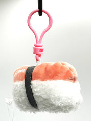 Who wouldn’t love an adorable Spam Musubi Plushie Keychain?!  This sushi-inspired keychain, giving off strong Aloha Hawaii vibes, combines the deliciousness of spam musubi with the cuteness of a plushie, and lo, the perfect quirky accessory for sushi lovers is born.