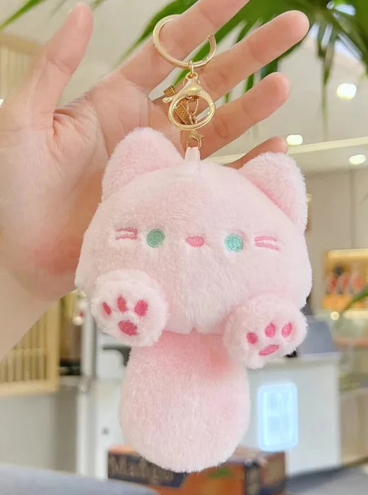 Let the Kawaii Kittens Assorted Plush Keychains brighten your day with their purr-fectly sweet charm!

This adorable accessory captures the playful personality of the world's most popular pet in an ultra-cute and portable design.&nbsp;A squishy round shape, rosy cheeks, chubby tail, and big sparkling eyes make these lil' ones irresistable.

Perfect for cat lovers, kawaii enthusiasts, or anyone who adores tiny, cuddly accessories.