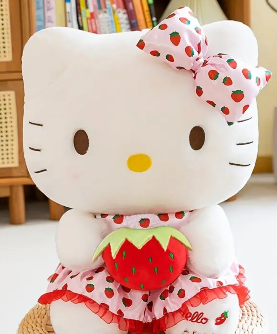 Our delightful Strawberry Fields Hello Kitty Plushie features the Sanrio diva in an adorable strawberry print dress&nbsp;—a delightful blend of mischief and charm! Dressed in a vibrant strawberry print dress adorned with playful bow ruffles, she’s the perfect embodiment of summer whimsy. With her cheeky grin and eye-catching design, this plushie stands out as a unique collectible or a sweet companion.

Made from plush, high-quality materials, she invites endless cuddles while adding a pop of color