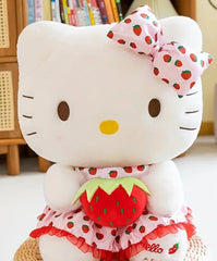 Our delightful Strawberry Fields Hello Kitty Plushie features the Sanrio diva in an adorable strawberry print dress&nbsp;—a delightful blend of mischief and charm! Dressed in a vibrant strawberry print dress adorned with playful bow ruffles, she’s the perfect embodiment of summer whimsy. With her cheeky grin and eye-catching design, this plushie stands out as a unique collectible or a sweet companion.

Made from plush, high-quality materials, she invites endless cuddles while adding a pop of color