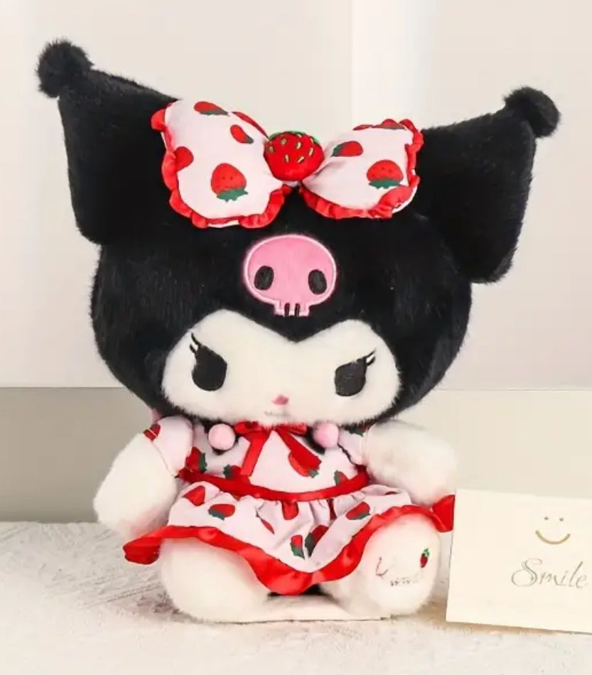 Our delightful Strawberry Fields Kuromi Plushie features Kuromi in an adorable strawberry print dress&nbsp;—a delightful blend of mischief and charm! Dressed in a vibrant strawberry print dress adorned with playful bow ruffles, she’s the perfect embodiment of summer whimsy. With her cheeky grin and eye-catching design, this plushie stands out as a unique collectible or a sweet companion.