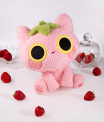 Soft, silly, and full of love, Strawmi is boutique designer MikouArt's sweetest design! Strawmi’s iconic strawberry head and tail are made with custom materials and sewing techniques. Two tiny, movable strawberries on the tail add some extra playful charm.