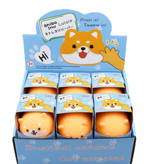 Reduce those stressful moments with the calmingly adorable face, bright happy colors, and round squishy bod of this delightful fidget toy.&nbsp;  The Stress Reducing Shiba Inu Squishy Sensory Toy comes packed in cheerful and sweet packaging, making it a perfect gift for children and adults alike.