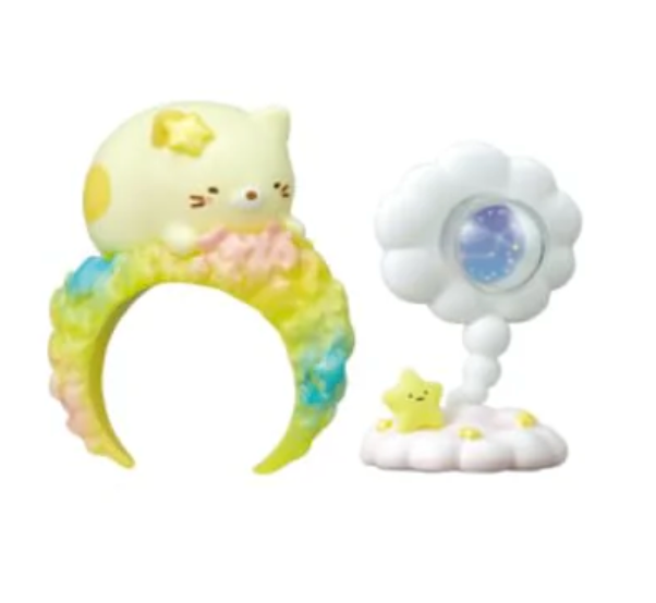 Embark on a celestial adventure with the Sumikko Gurashi Starry Sky Ring &amp; Holder Blind Box! Each box contains a surprise ring and matching holder, featuring your favorite Sumikko Gurashi characters—like Shirokuma and Tokage—in dreamy clouds and starry sky themes. The rings are beautifully detailed, with enchanting designs that capture the magic of the night sky, while the holders provide a charming way to display and store your ring.