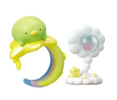 Embark on a celestial adventure with the Sumikko Gurashi Starry Sky Ring &amp; Holder Blind Box! Each box contains a surprise ring and matching holder, featuring your favorite Sumikko Gurashi characters—like Shirokuma and Tokage—in dreamy clouds and starry sky themes. The rings are beautifully detailed, with enchanting designs that capture the magic of the night sky, while the holders provide a charming way to display and store your ring.