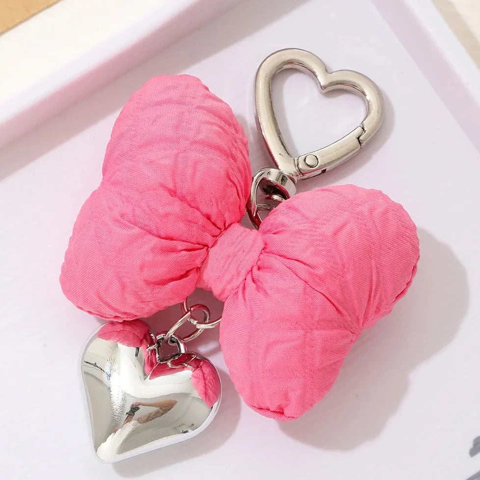 Add a touch of sweetness to your accessories with the Sweetheart Big Kawaii Cloth Bow Keychains! These oversized, fabric bows come in a variety of charming pastel colors and feature a soft, plush texture that’s both cute and eye-catching. Perfect for attaching to your keys, bags, or backpacks, these keychains add a playful, girly flair to any outfit.