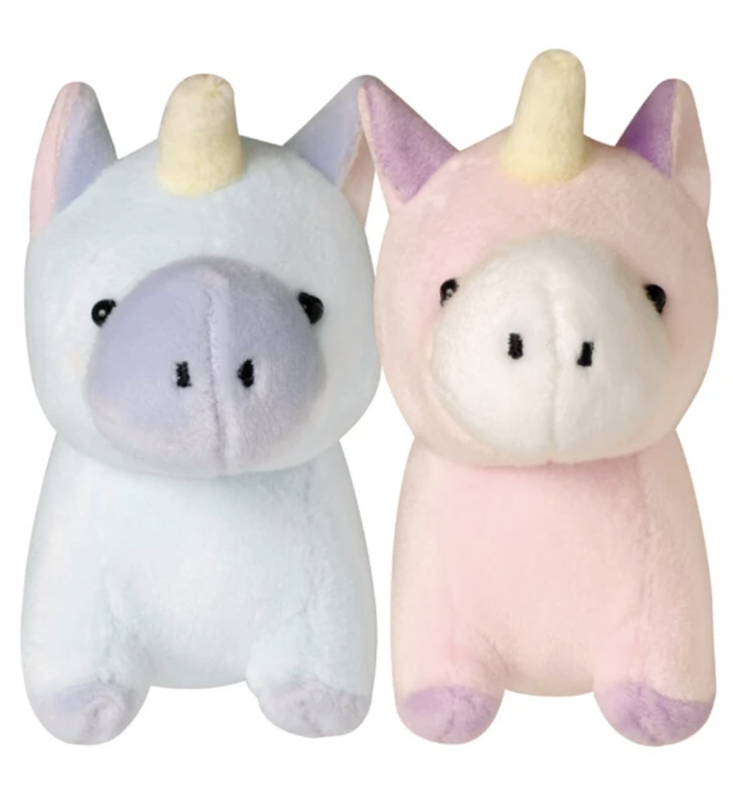 Embrace the magic with our Unicorn Buddy Magnetic Plush Keychains! Delightfully charming, these keychains feature an enchanting unicorn design that adds a touch of whimsy to your everyday carry.    With magnetic hands, they easily attach to any metallic surface, making them perfect for keys, bags, or even your refrigerator. Crafted with soft, plush materials, they're as cuddly as they are cute.  