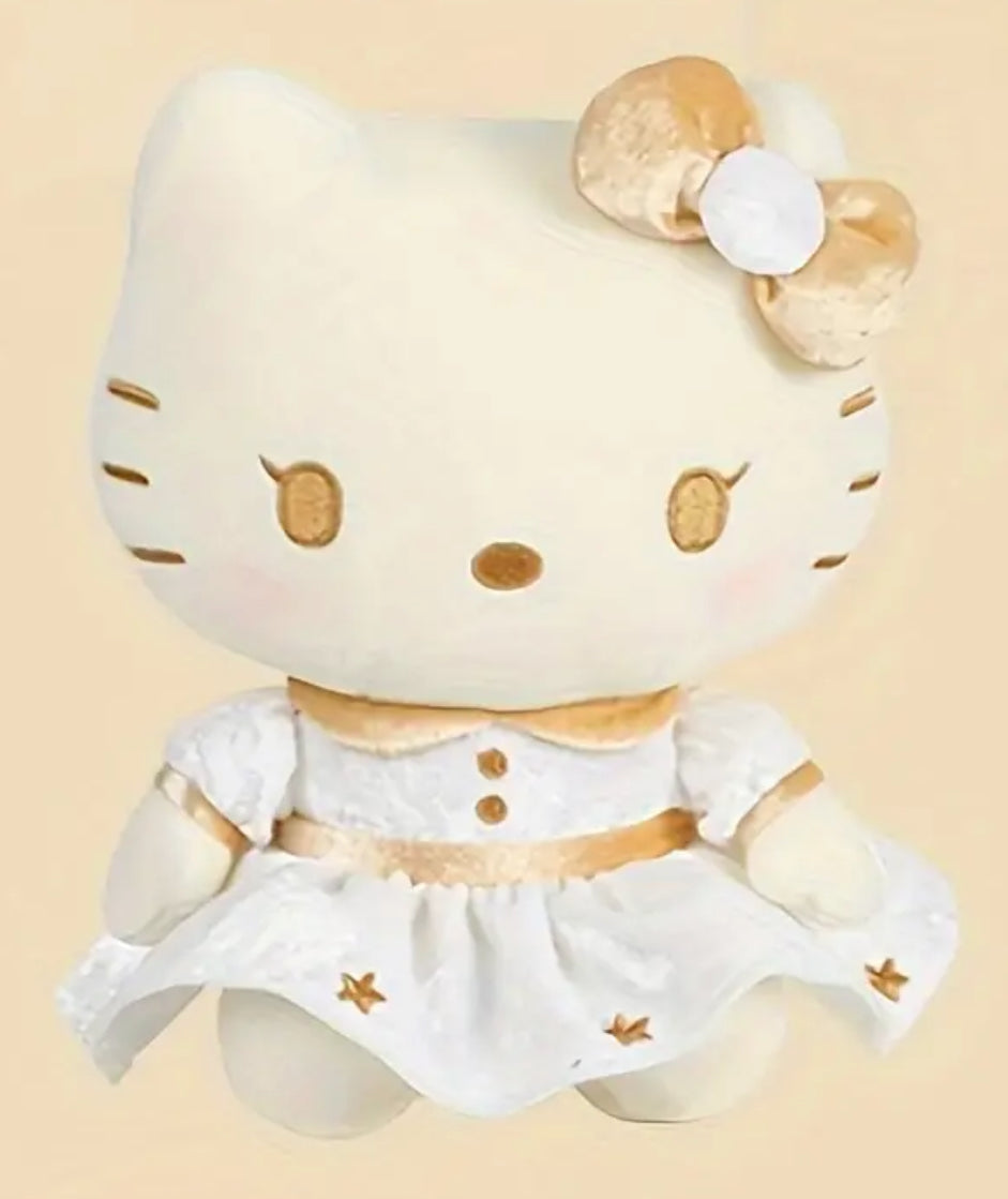 This elegant Hello Kitty plushie adds a touch of luxury with its cream, white, and shimmering gold palette. Hello Kitty wears a lovely white dress adorned with delicate gold details, and her signature bow is transformed in a brilliant gold hue.

Soft and beautifully crafted, this plushie offers a stylish twist on the classic Hello Kitty look, making it perfect for both cuddles and display. Ideal for collectors and fans, this gold-themed Hello Kitty plush brings sophistication and charm to any collection!