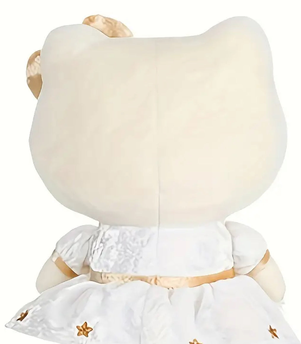 This elegant Hello Kitty plushie adds a touch of luxury with its cream, white, and shimmering gold palette. Hello Kitty wears a lovely white dress adorned with delicate gold details, and her signature bow is transformed in a brilliant gold hue.

Soft and beautifully crafted, this plushie offers a stylish twist on the classic Hello Kitty look, making it perfect for both cuddles and display. Ideal for collectors and fans, this gold-themed Hello Kitty plush brings sophistication and charm to any collection!