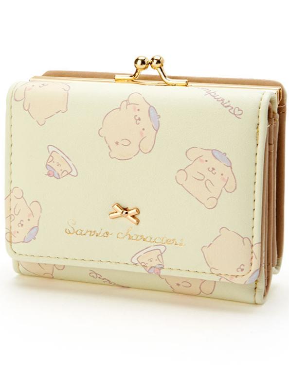 Add a touch of adorable charm to your daily essentials with this Yellow Pompompurin Sanrio Gold Bow Wallet! Perfect for fans of the beloved Sanrio character, Pompompurin, this wallet is as functional as it is cute.

Featuring Pompompurin in a baby yellow design, the wallet is accented with a stylish gold bow and gold clasp, giving it a chic, feminine look.

Made from durable synthetic leather, with multiple compartments for cards, cash, and coins.