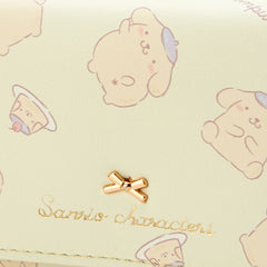 Add a touch of adorable charm to your daily essentials with this Yellow Pompompurin Sanrio Gold Bow Wallet! Perfect for fans of the beloved Sanrio character, Pompompurin, this wallet is as functional as it is cute.

Featuring Pompompurin in a baby yellow design, the wallet is accented with a stylish gold bow and gold clasp, giving it a chic, feminine look.

Made from durable synthetic leather, with multiple compartments for cards, cash, and coins.